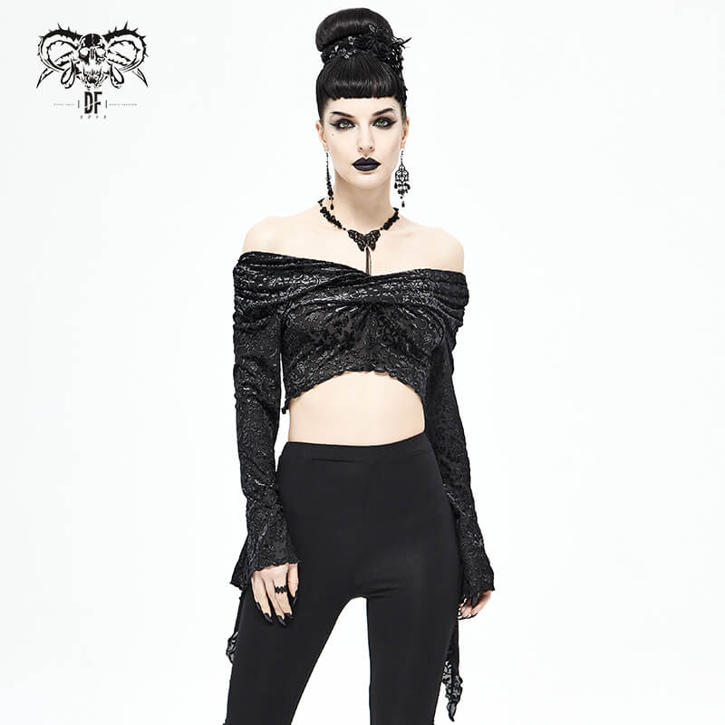 Black gothic crop top with gathered neckline and open-shoulder design, paired with stylish black pants.