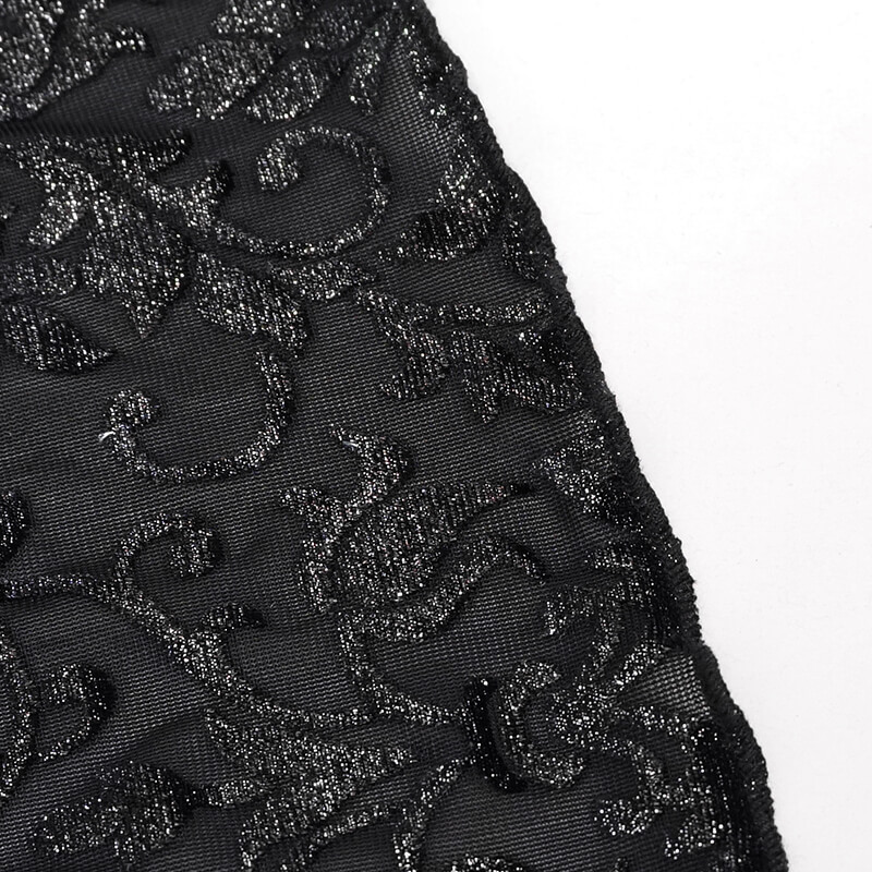 Close-up of intricate black fabric with gothic floral pattern, perfect for a vintage women's crop top.