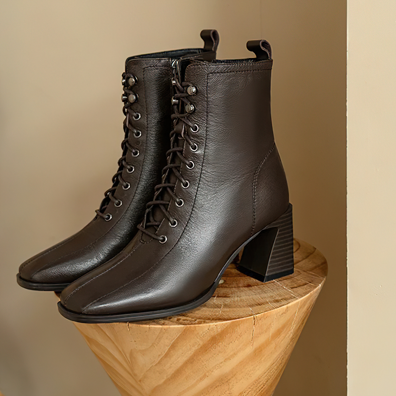 Stylish women's ankle boots in genuine leather with lace-up design, perfect for casual chic outfits.