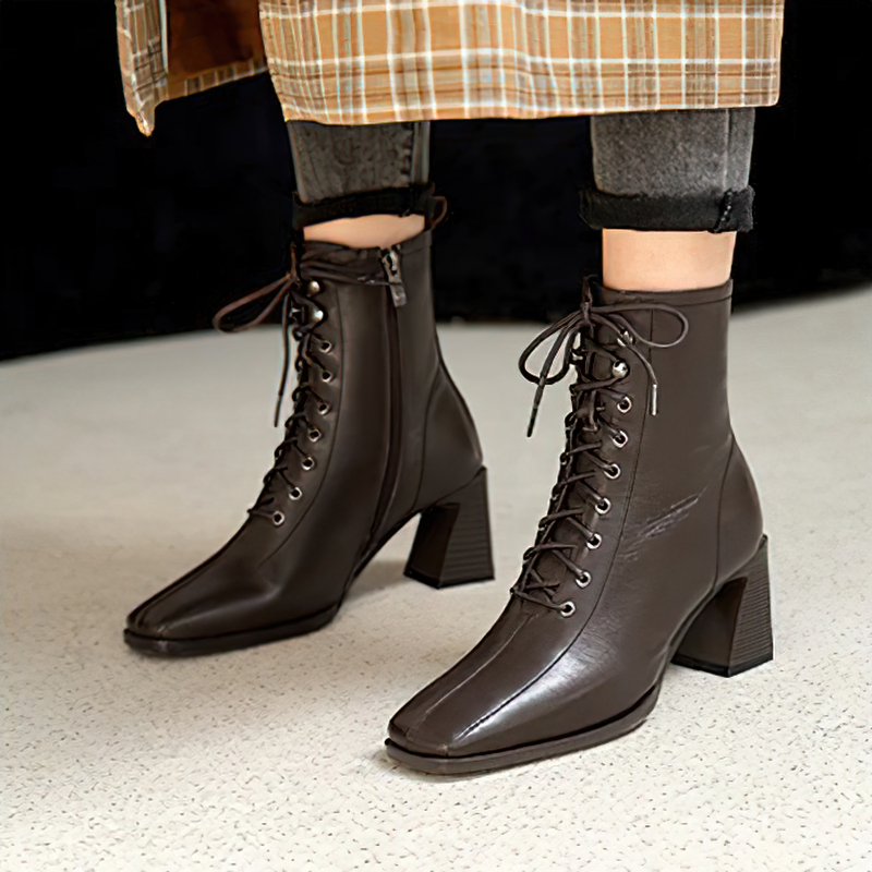 Brown ankle boots with laces and chunky heel, made of genuine leather for stylish casual looks.