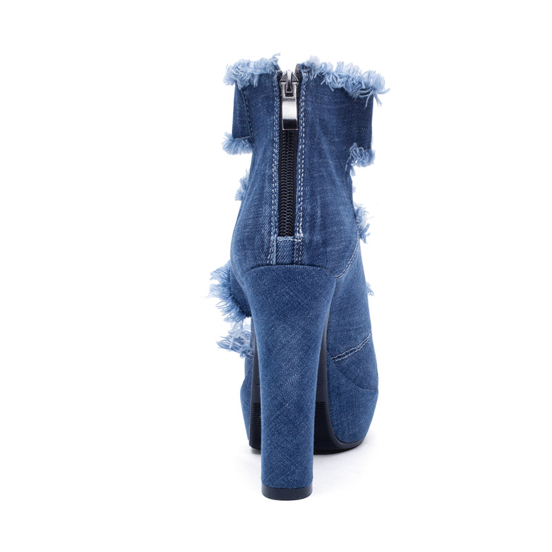 Trendy women's high heel zip shoes in denim with fringe details, perfect for summer fashion. Elevate your style and confidence!