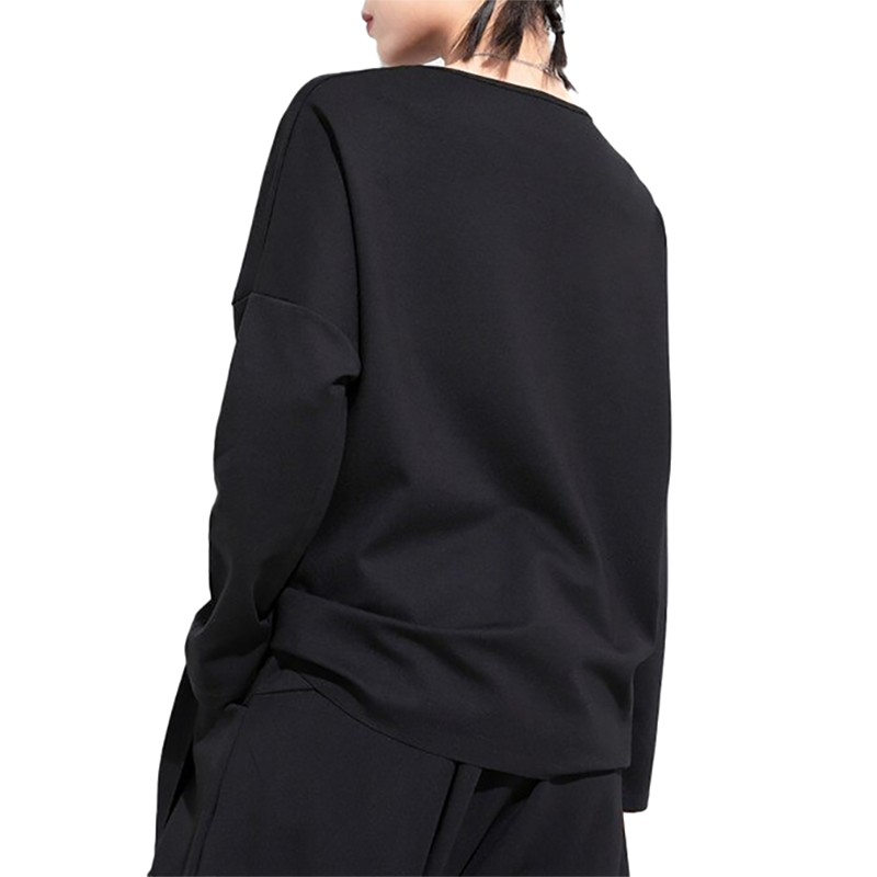 Back view of a black women's irregular long sleeve top, perfect for casual comfy outfits and alternative style.