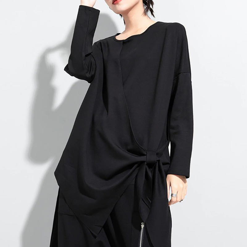 Stylish women's black irregular long sleeve pullover top, perfect for casual and comfy daily wear.