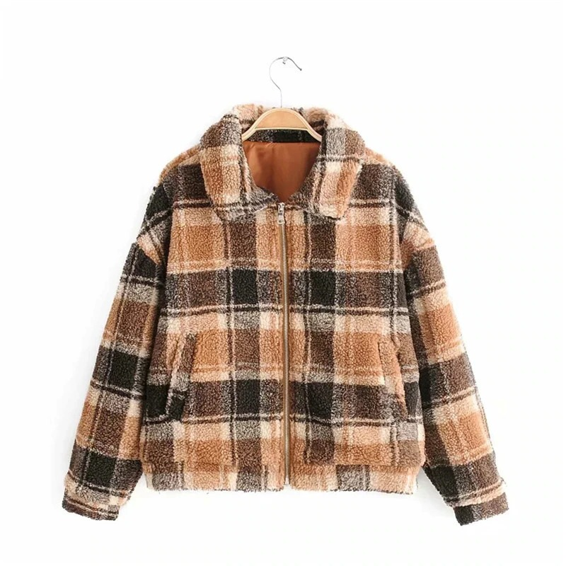 Cozy women's plaid lamb wool jacket in warm brown tones, featuring a zip closure and soft fleece fabric.
