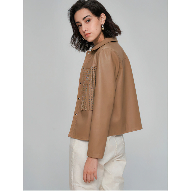 Stylish women's PU leather jacket in punk rock style featuring fringe and silver rivets, ideal for bikers.