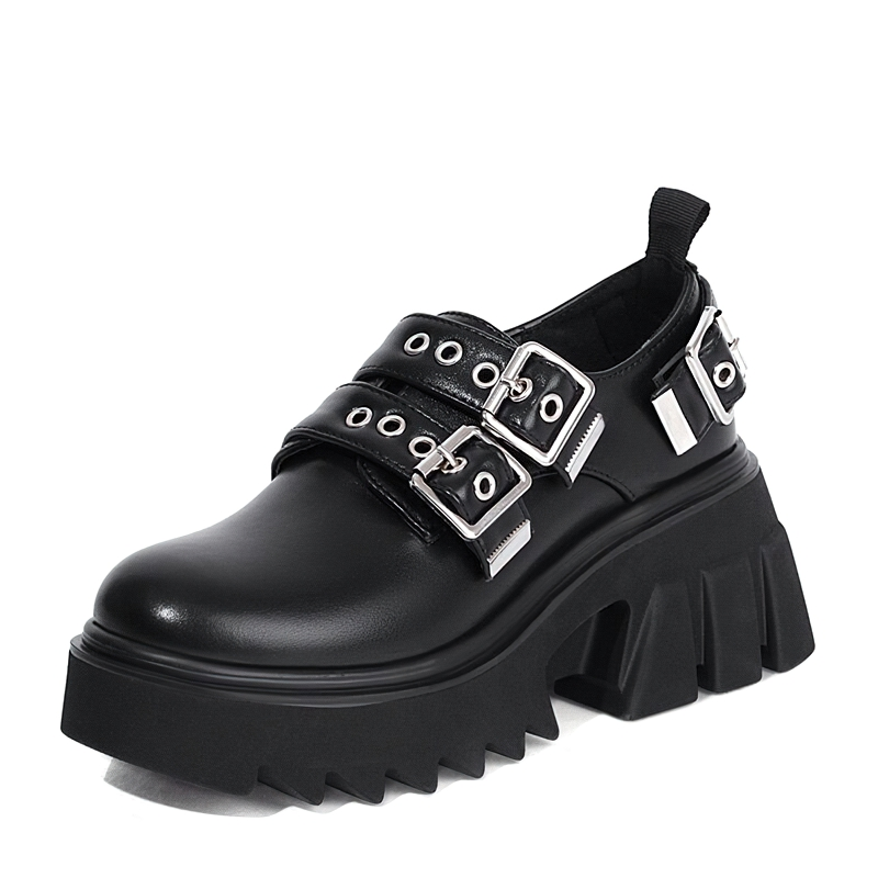 Stylish black PU leather loafers for women, featuring metal buckles and a chunky platform sole.