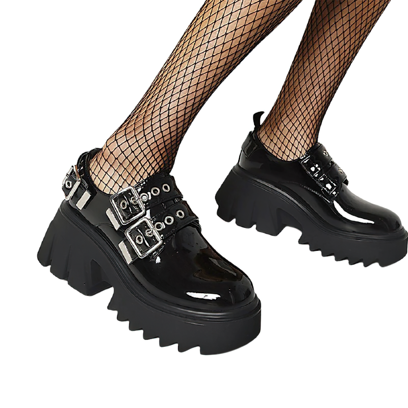 Fashionable women's black PU leather loafers with metal buckles and chunky soles, perfect for an alternative gothic style.