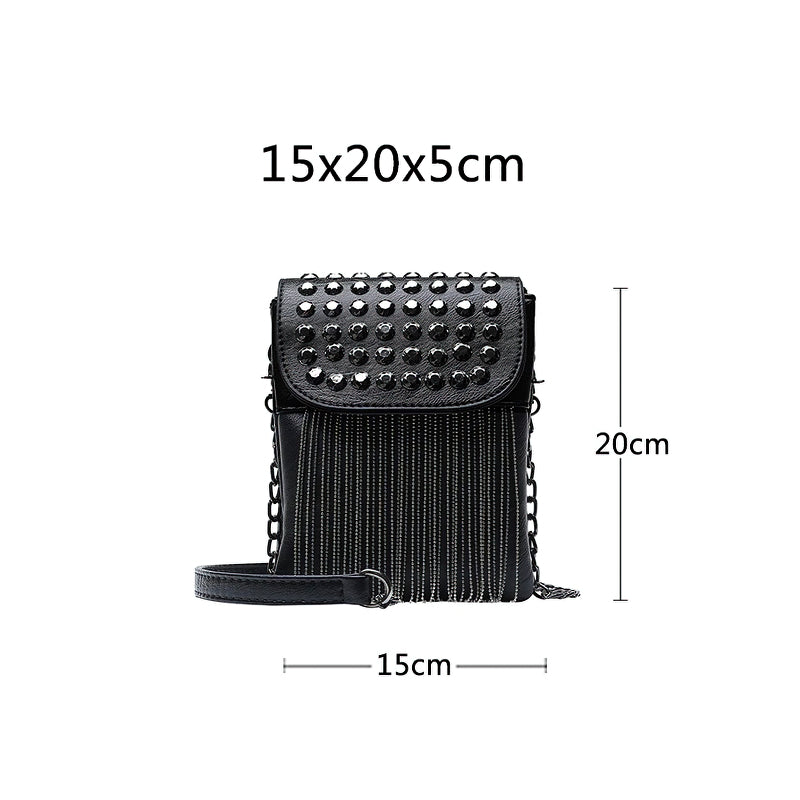 Trendy black women's shoulder bag with decorative chains and fringe, featuring diamond-like studs for stylish flair.