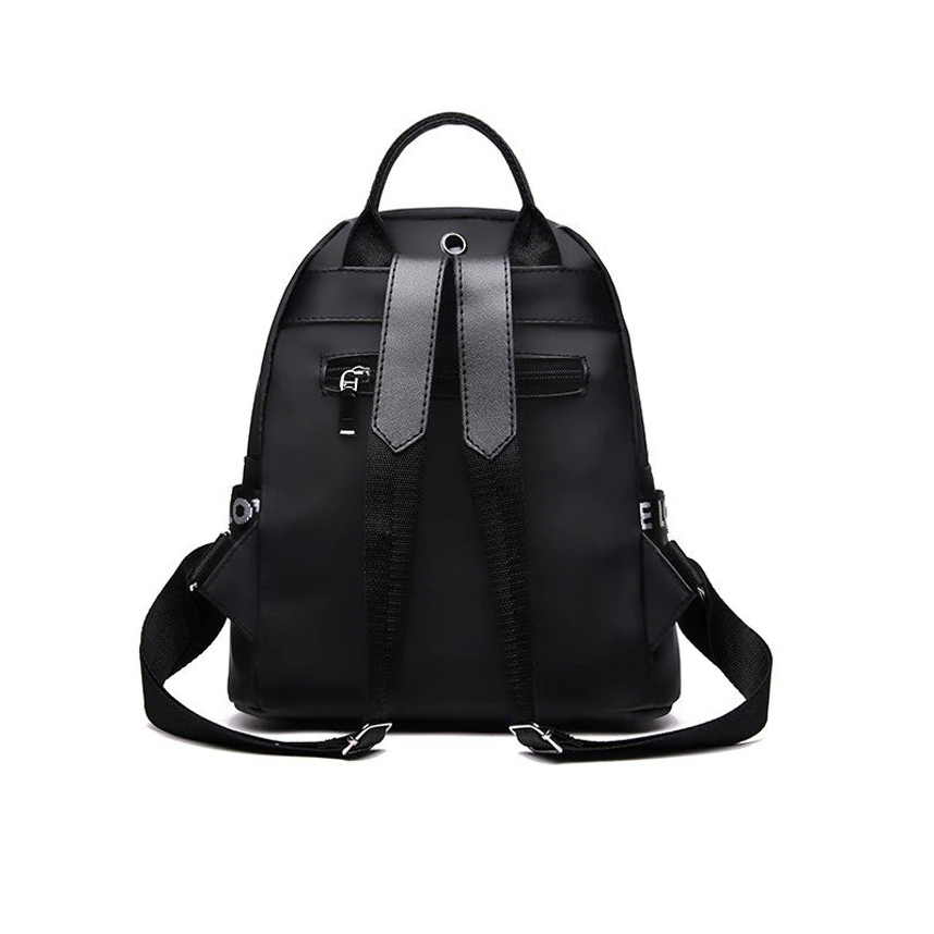 Fashion women's black PU leather travel backpack with adjustable straps and stylish design.