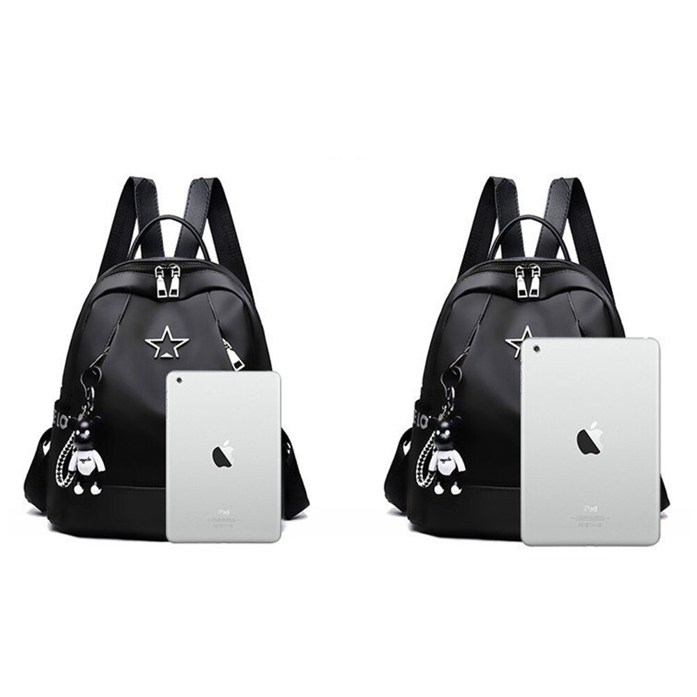 Stylish black women's PU leather backpack with star design, showcasing ample space for an iPad.