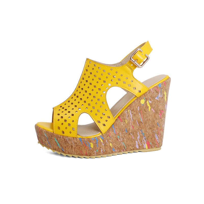 Bright yellow women's wedge sandals with cut-out design and cork platform, perfect for summer fashion.