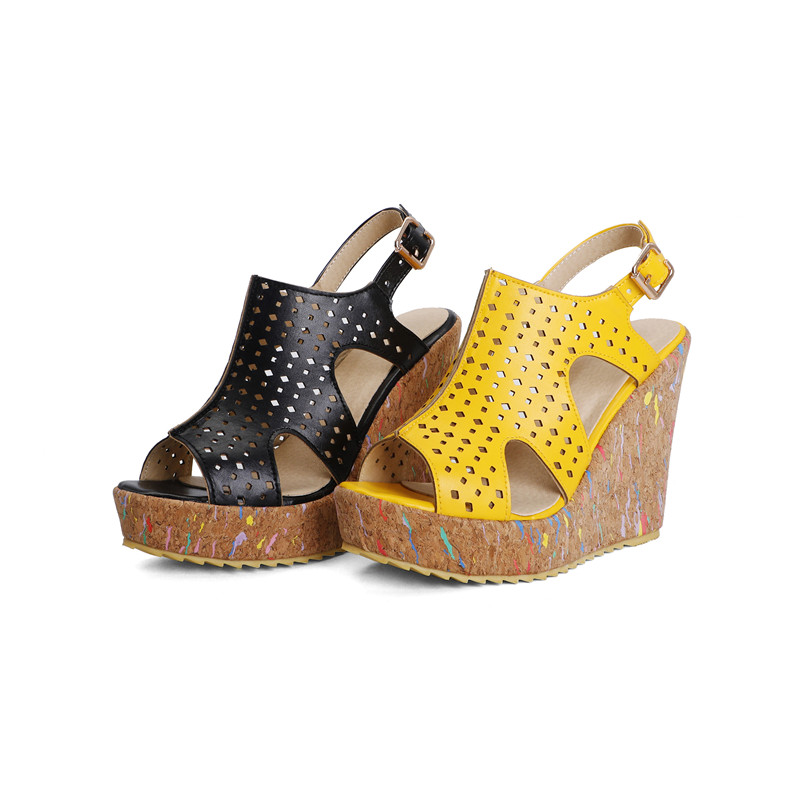 Trendy women's wedge sandals in black and yellow, featuring open sides and platform for summer style.