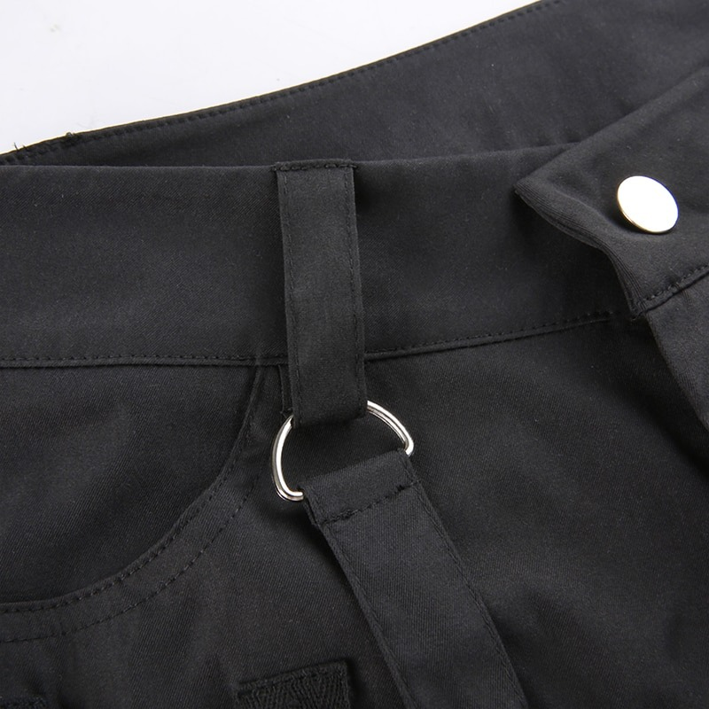 Close-up of the black wide-leg cargo pants showcasing the unique belt loop detail and stylish button.