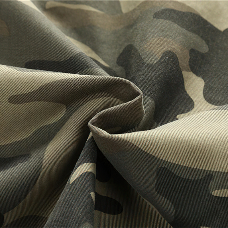 Close-up of stylish camouflage fabric, perfect for military-style denim jackets and casual wear.