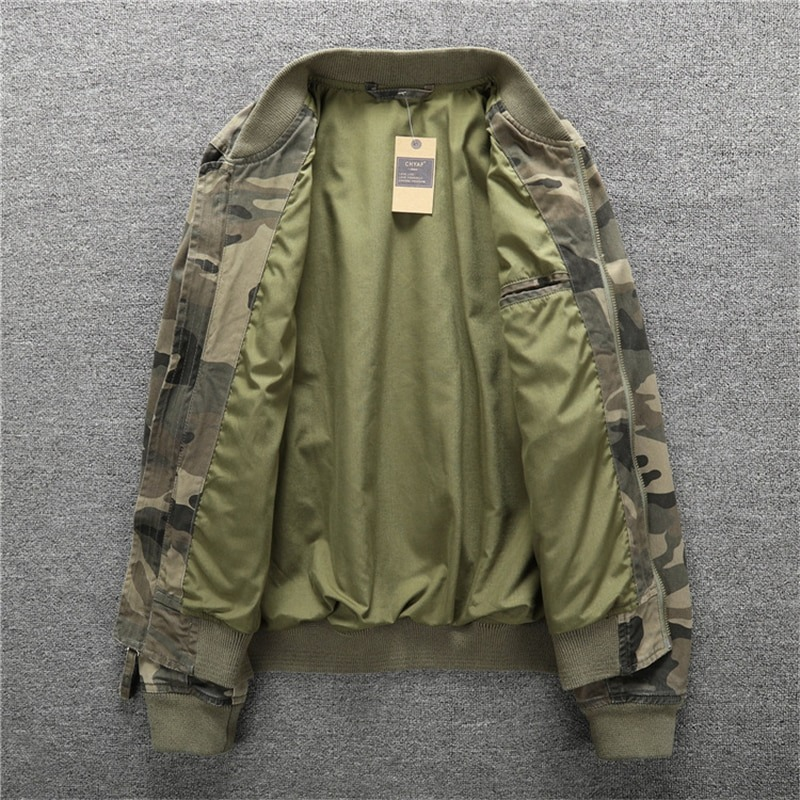 Inside view of a stylish men's camo denim jacket with military-inspired design and olive lining.