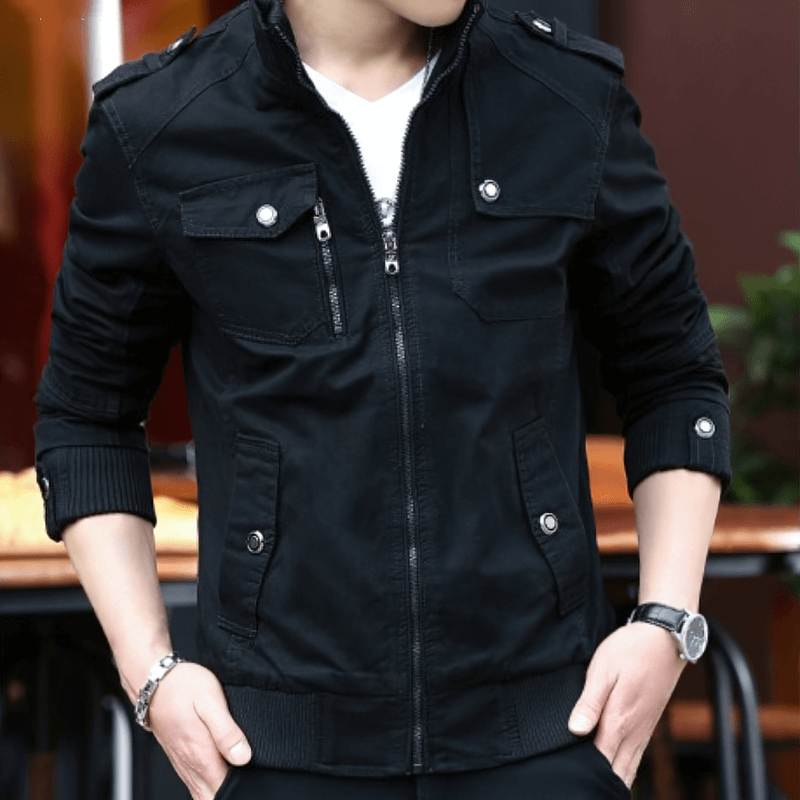 Stylish male model wearing a black military zipper jacket with pockets, perfect for casual outfits.