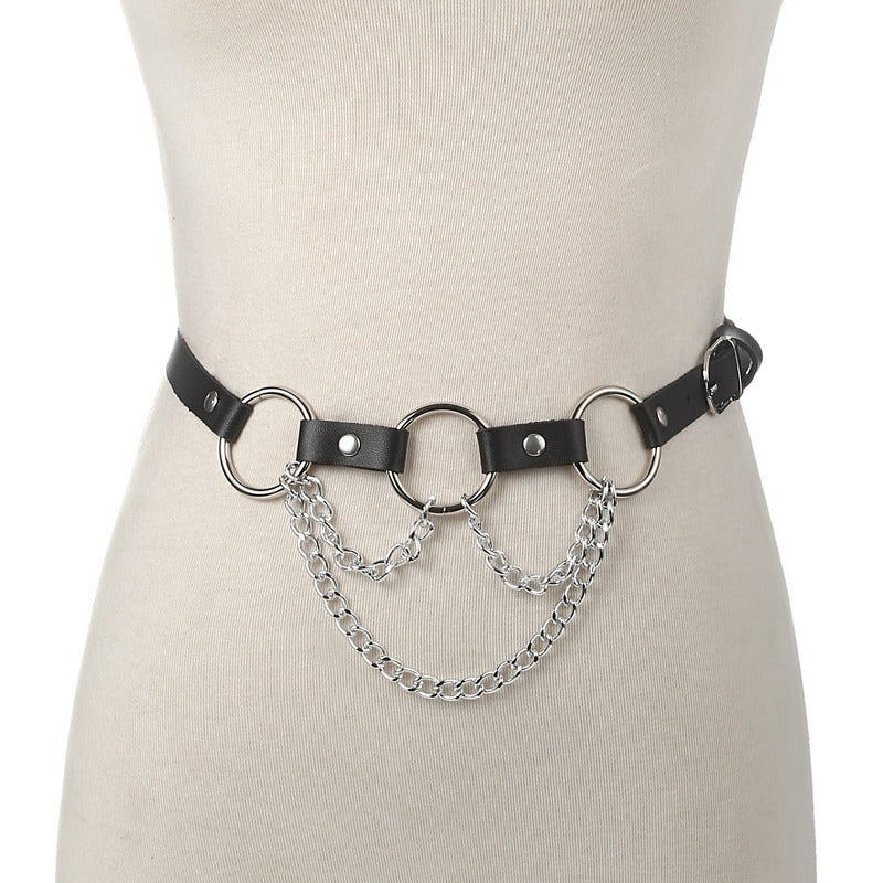 Stylish faux leather body harness with metal chain for women, perfect for gothic or edgy fashion looks.