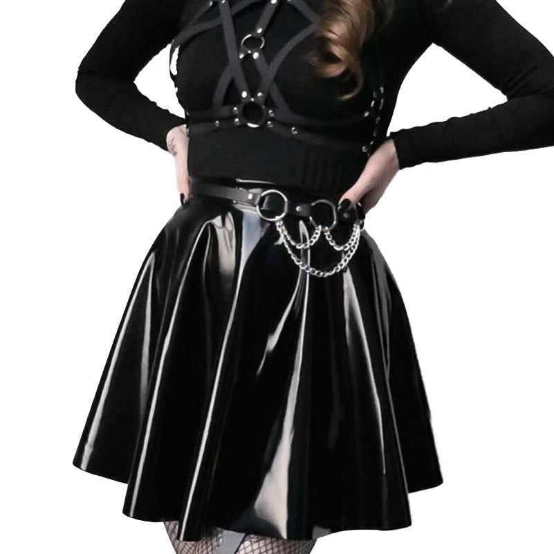 Faux leather body harness and high-waisted skirt with chain detail for women, perfect for gothic and edgy fashion.
