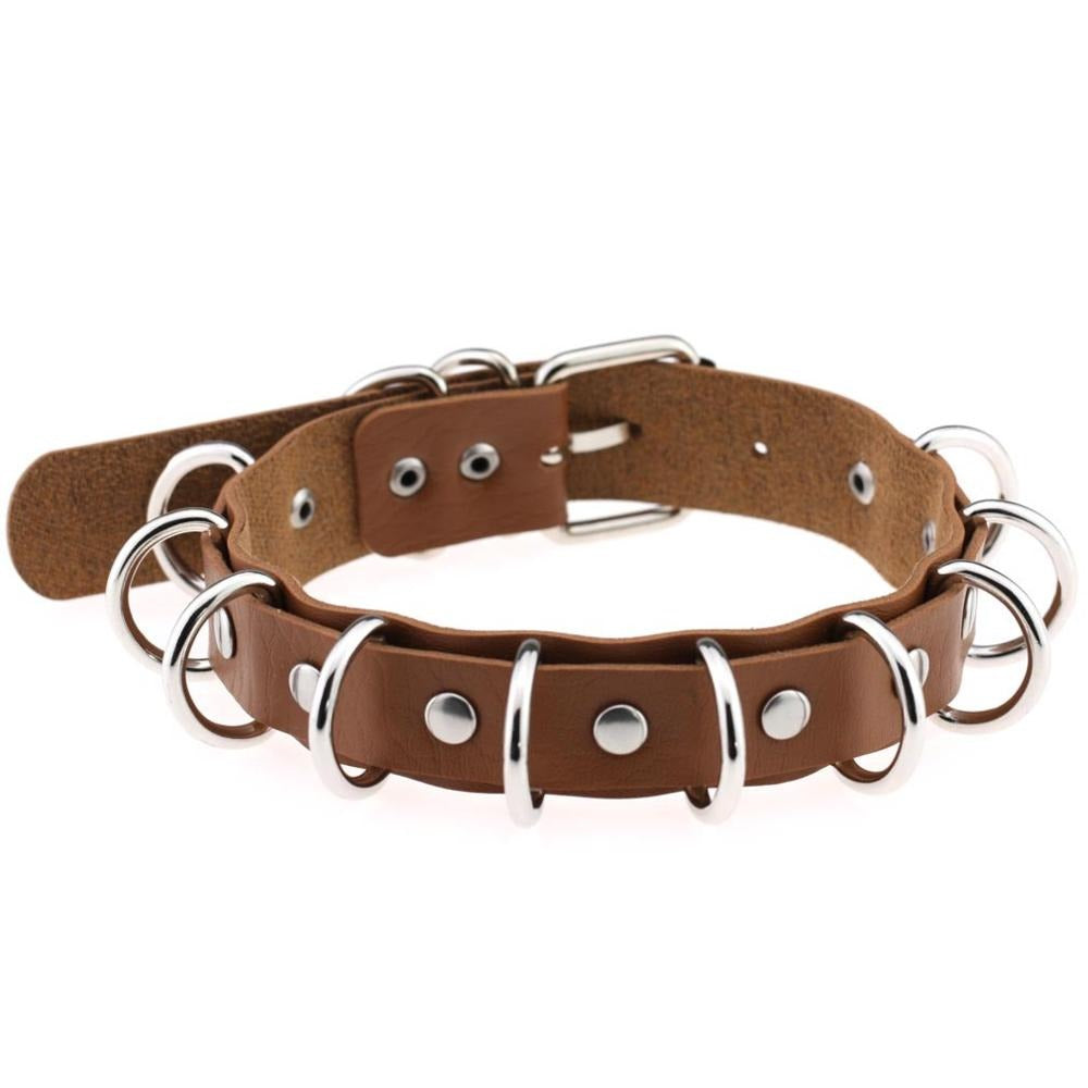 Faux leather choker with metal rings in brown, perfect for vintage rock and goth style accessories.