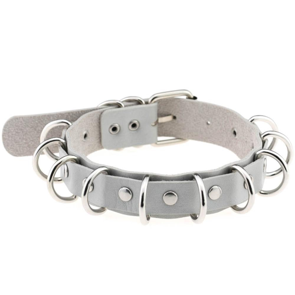 Faux leather choker with metal rings, perfect for goth accessories and vintage rock punk fashion.