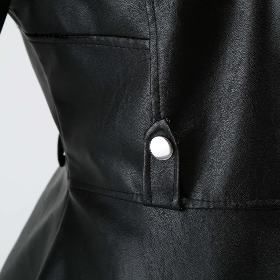 Close-up of a women's faux leather motorcycle jacket, showcasing detailed stitching and silver snap buttons.