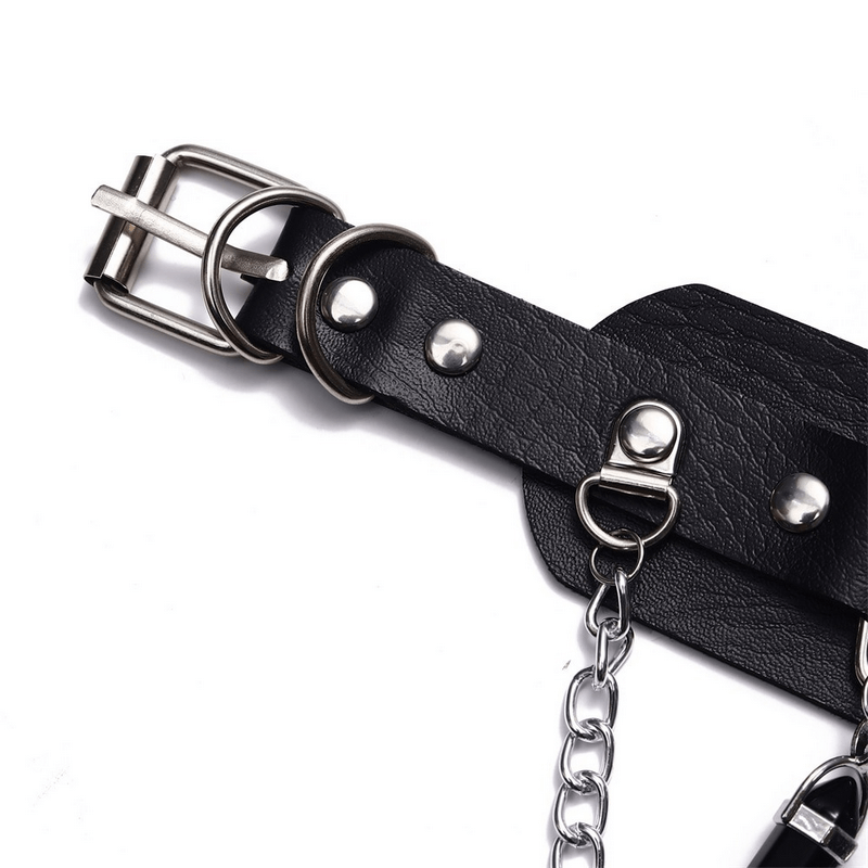 Close-up of black faux leather choker with silver buckle and chain, showcasing gothic style accessories for women.