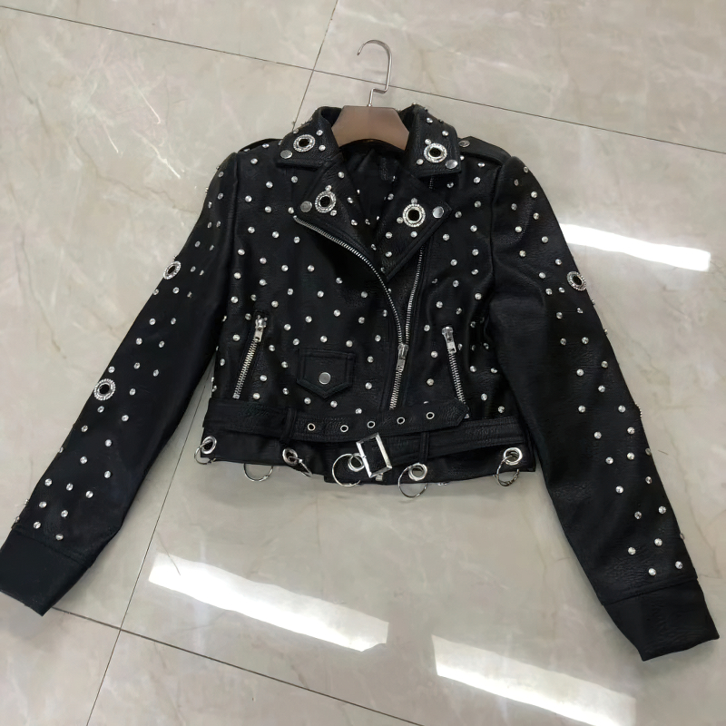 Faux leather women's jacket with silver rivets in rock style, perfect for alternative fashion outfits.