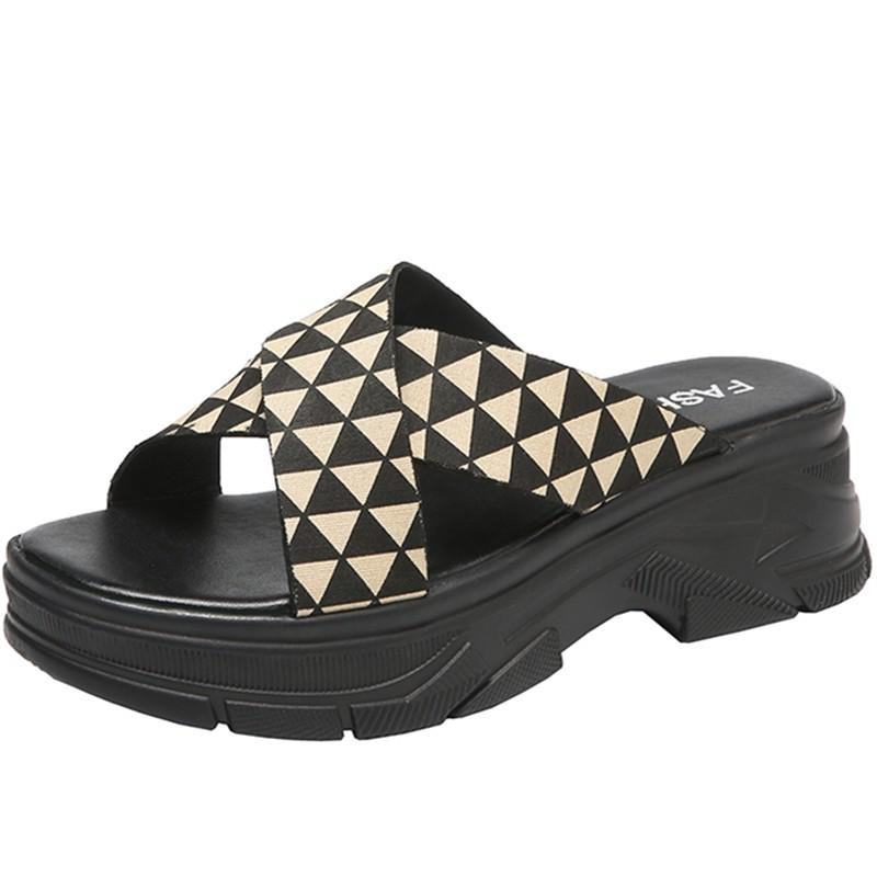 Stylish black and beige alternative style sandals for women with geometric pattern design.