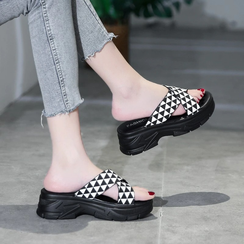 Trendy black and white alternative sandals for women, perfect for a fashionable aesthetic style.