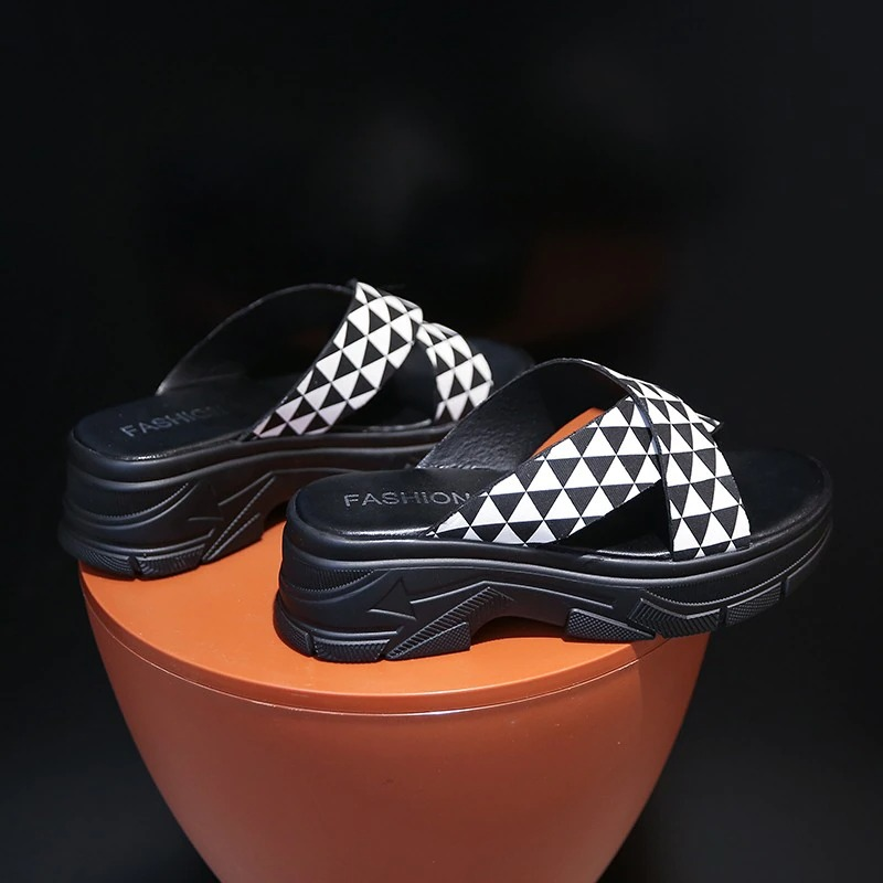 Trendy black and white aesthetic sandals with geometric design, perfect for alternative fashion lovers.