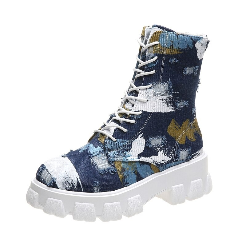 Stylish blue and white combat boots with a chunky sole, perfect for a rocker girl outfit and alternative fashion.