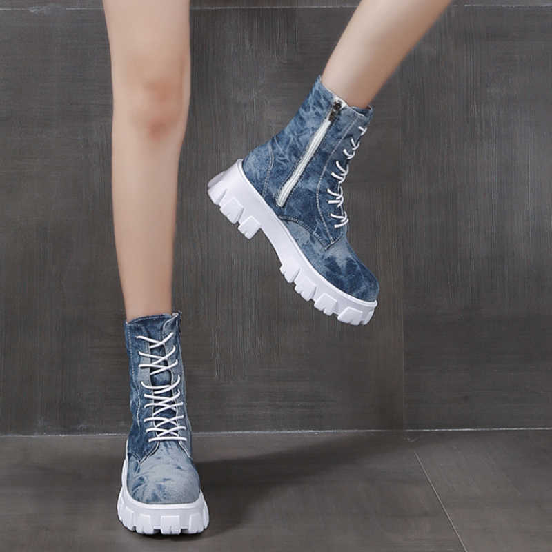 Trendy women's denim combat boots with zipper and laces, perfect for alternative or rocker girl outfits.