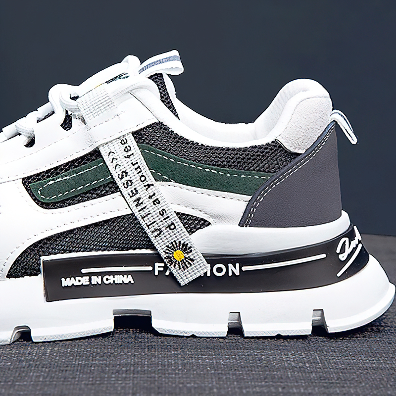 Close-up of stylish female lace up sneakers with green accents and thick soles, perfect for casual wear.