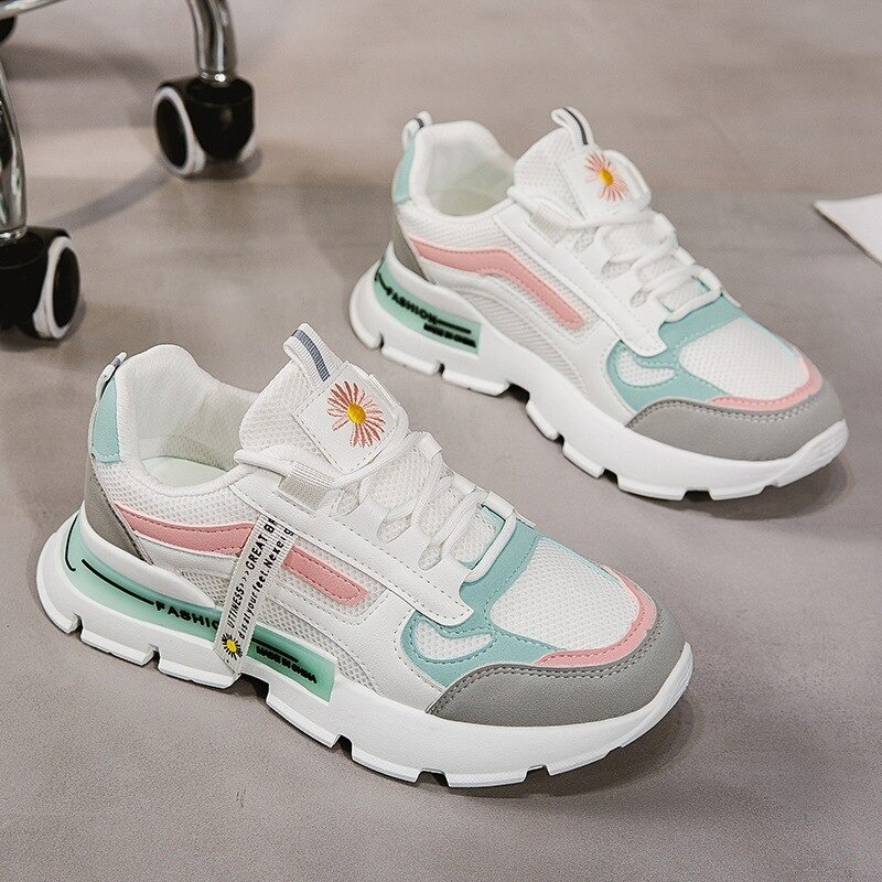 Stylish female lace-up sneakers with daisy design, featuring a thick bottom and casual patchwork style.