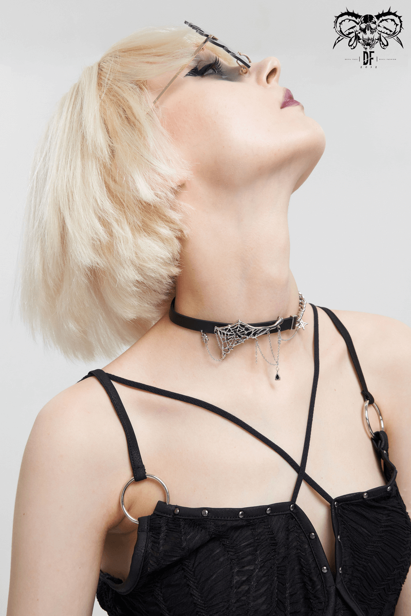 Asymmetrical black leather choker with spider web and silver chain, perfect gothic accessory for women.