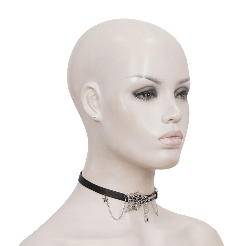 Asymmetrical black leather choker with spider web design and silver chains on a mannequin.