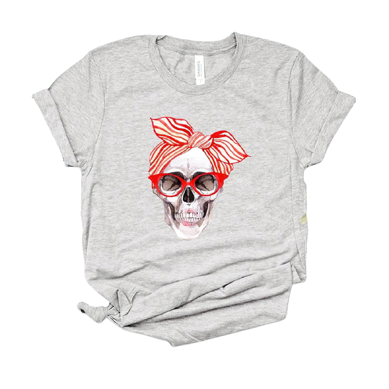 Women's gray short sleeve t-shirt featuring a stylish skull print with a red bow and sunglasses.