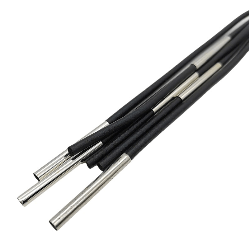 Close-up of stylish black rubber long earrings with metal accents, perfect for punk fashion lovers.