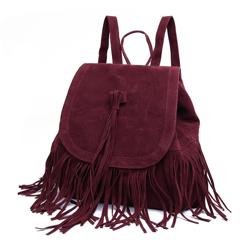 Burgundy suede backpack with tassels, perfect for women’s alternative fashion. Unique design for stylish everyday use.
