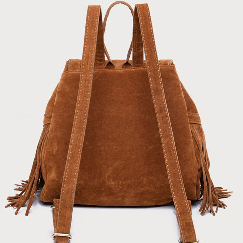 Unique brown suede backpack with tassels, perfect for women’s alternative fashion and everyday outfits.