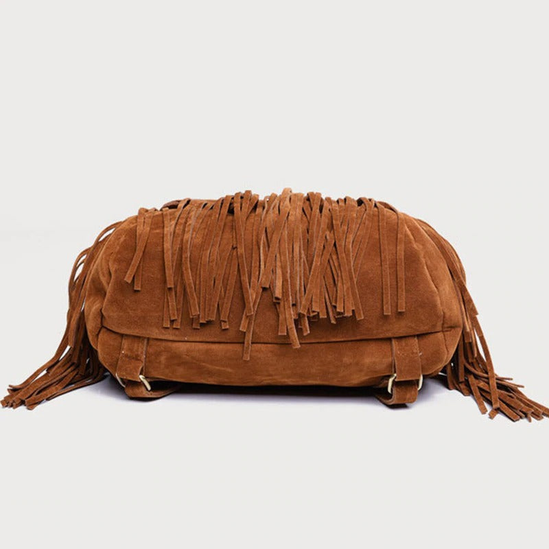 Stylish brown suede backpack with tassels, perfect for women’s alternative fashion and everyday outfits.
