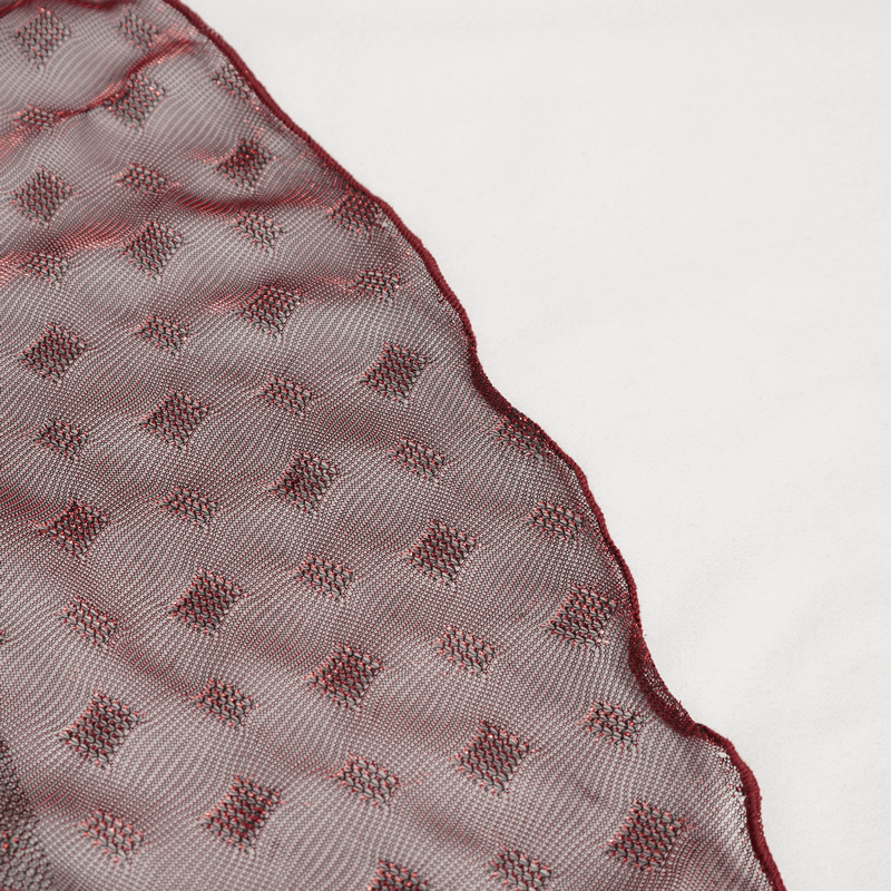 Close-up of the wine red mesh fabric with irregular layered texture and dotted pattern for grunge style skirt.