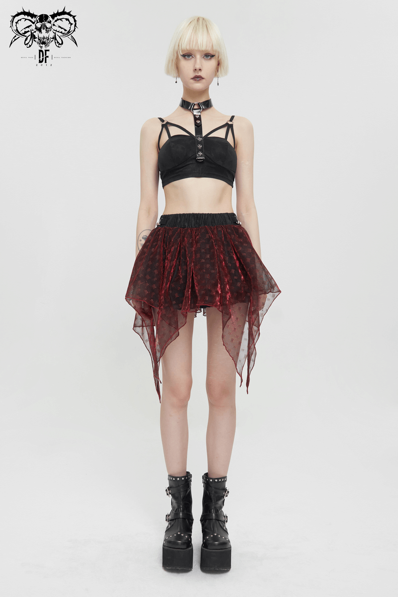 Model wearing a female wine red irregular layered mesh skirt with a black strappy crop top and platform boots.