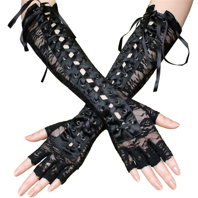 Elegant long black lace fingerless gothic gloves with ribbon ties and rivet details for stylish outfits.