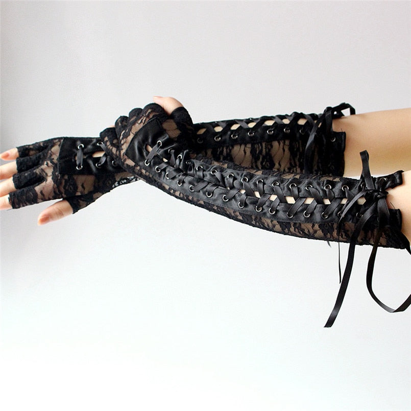 Long black lace fingerless gothic gloves with ribbon and rivets, perfect for cosplay or gothic fashion.