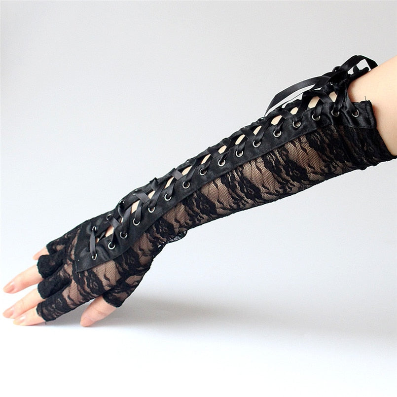 Gothic fingerless lace gloves in black with ribbon and rivet detail, perfect for cosplay and fashion statement.