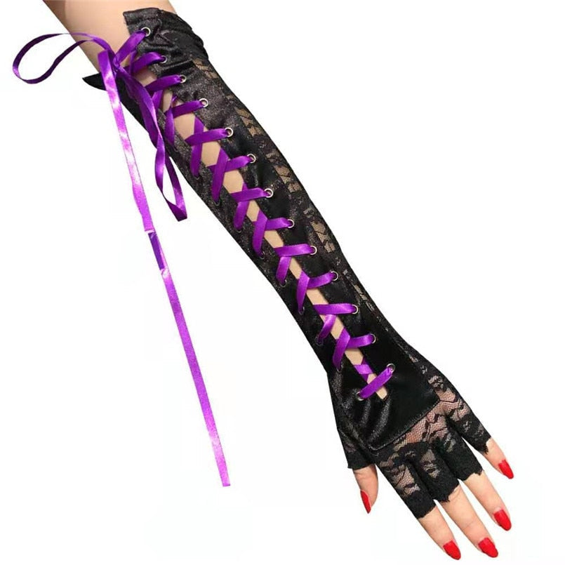 Long black lace fingerless gothic gloves with purple ribbons and rivets, perfect for cosplay and stage performances.