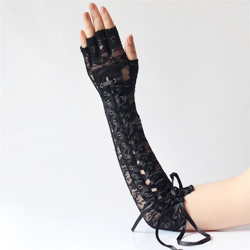 Long black lace fingerless gothic gloves with ribbon and rivets, perfect for cosplay or gothic fashion.
