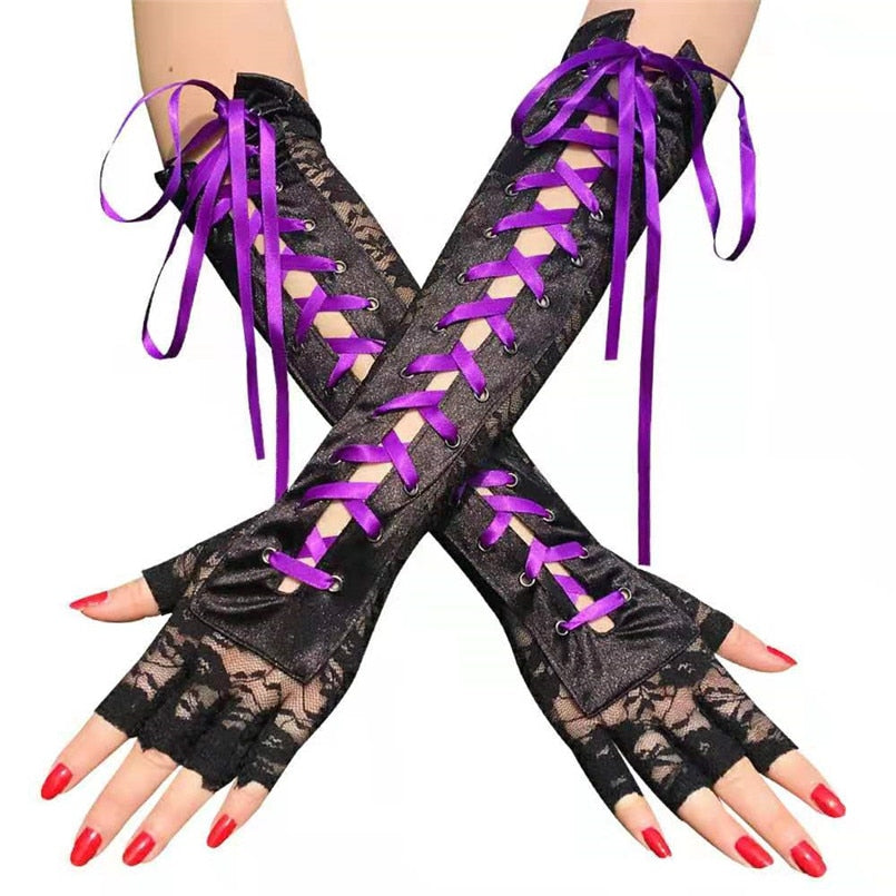 Long fingerless gothic gloves in black lace with purple ribbons, perfect for cosplay or gothic fashion.