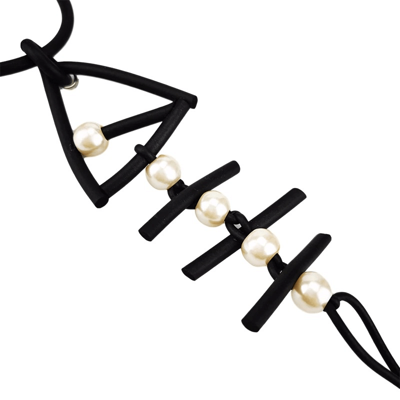 Gothic fish bone pendant necklace featuring rubber and pearl accents for a stylish women's accessory.